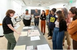 Students studying collections materials